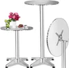 Two silver pedestal bar tables, one with a drink, flowers, cake, and coffee cup. Náhled obrázku produktu