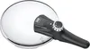 A close-up, top-down view of a pressure cooker lid with its handle and control mechanism. Anteprima dell’immagine prodotto