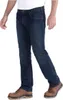 A person wearing jeans and boots, shown from the waist down, against a white background. Podgląd zdjęcia produktu