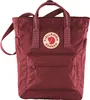 A studio shot of a red Fjällräven Kånken Totepack Rucksack. Produktbild-Vorschau