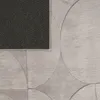 A close-up view of a light gray rug with a geometric pattern of circles. The backing of the rug is visible in the top left corner. Produktbild-Vorschau