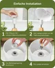 Four-panel image showing the steps for assembling a lamp. Produktbild-Vorschau