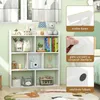 A white geometric bookshelf with 7 compartments filled with various children's toys and books, placed in a room with light green walls and a patterned rug. Produktbild-Vorschau