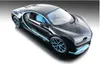 A black Bugatti Chiron model car with blue accents and interior, displayed on a reflective surface against a gradient background. Voir les images du produit