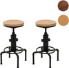 Two industrial-style bar stools with wooden seats and black metal pipe bases are shown against a white background. Small circular swatches showing different wood finishes are in the upper right corner. Produktbild-Vorschau