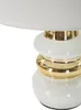 A close-up view of a white and gold table lamp base. Náhľad obrázku produktu