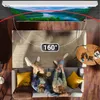 A couple relaxing on a couch watching a projection screen in a living room. Produktbild-Vorschau