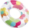A colorful inflatable swim ring with a floral pattern. Anteprima dell’immagine prodotto