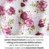 A close-up view of a fabric with a floral pattern, featuring roses and leaves, with descriptive text below. Produktbild-Vorschau