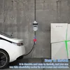 An electric car is plugged into a charging station with a battery system in the background. Produktbild-Vorschau