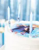 Close-up of a white birthday cake with Disney Frozen themed candles and edible image. Anteprima dell’immagine prodotto