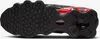 The underside of a black and red Nike Shox TL sneaker. Produktbild-Vorschau