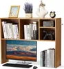 A wooden desk shelf unit with books, a monitor, keyboard, mouse, and decorative items. Voir les images du produit