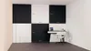 A modern office setup with a desk, chair, and a wall decorated with black and white panels, some of which have dimensions indicated. Anteprima dell’immagine prodotto