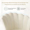 Close-up of a beige chair's backrest with descriptive text and icons. Voir les images du produit