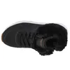 A top-down view of a black Skechers sneaker with faux fur trim. Voir les images du produit