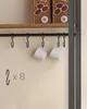S-hooks hanging on a black bar, with two white cups hanging from two of the hooks. Náhled obrázku produktu