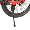 A close-up view of the rear wheel and kickstand of a bicycle. Produktbild-Vorschau