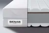 A cross-section of a mattress is shown, revealing its internal layers and construction. Produktbild-Vorschau