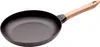 A black cast iron frying pan with a light brown wooden handle, shown from a diagonal angle against a white background. Náhľad obrázku produktu