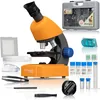 A microscope and its accessories are displayed on a white background. Produktbild-Vorschau