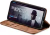 A smartphone in a brown flip case is displayed, showing a movie poster on its screen. Produktbild-Vorschau