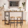 A living room scene with a bar table and stools in the foreground, a sofa and fireplace in the background. Produktbild-Vorschau