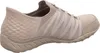 Side view of a beige and gray Skechers women's slip-on shoe. Náhled obrázku produktu