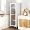 A white, narrow kitchen cabinet with glass doors and wooden accents is shown in a kitchen setting. Podgląd zdjęcia produktu