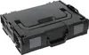A black tool case with gray latches and handle, shown from a slightly elevated diagonal angle against a white background. Podgląd zdjęcia produktu