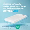 A white mattress with a teddy bear imprint is shown on a light blue background, with dimensions and certifications indicated. Produktbild-Vorschau