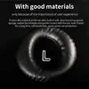 A close-up of a black headphone earpad with the letter 'L' printed on it, set against a dark background. Produktbild-Vorschau
