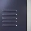 A close-up view of the side of a dark gray metal locker with horizontal vents. Anteprima dell’immagine prodotto