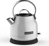 A white KitchenAid electric kettle on a black base, shown against a white background. Produktbild-Vorschau