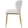 A side view of a single beige velvet dining chair with gold legs. Produktbild-Vorschau