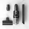 A cordless handheld vacuum cleaner and its accessories are laid out on a marble-like surface. Náhled obrázku produktu