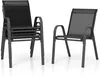 A stack of four black outdoor chairs and one separate black outdoor chair. Náhled obrázku produktu