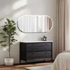 A bedroom scene featuring a dresser with a mirror above it, a plant, and curtains. Podgląd zdjęcia produktu