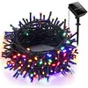 A coiled string of colorful LED lights with a solar panel stake. Produktbild-Vorschau
