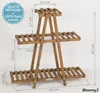 A wooden plant stand with three shelves, shown with dimensions indicated. Produktbild-Vorschau