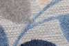 A close-up view of a rug with a geometric pattern. Náhľad obrázku produktu