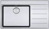 A top-down view of a stainless steel kitchen sink with a drainboard. Podgląd zdjęcia produktu