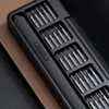 A close-up, overhead shot of a black electric screwdriver set with multiple bits neatly organized in compartments. Náhled obrázku produktu