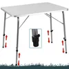 A silver folding camping table with adjustable legs. Produktbild-Vorschau