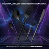 A collection of black cutlery is displayed against a dark, futuristic background with purple lighting effects. Produktbild-Vorschau