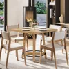 A dining set with a wooden table and four chairs in a room with a fireplace and a window overlooking a garden. Podgląd zdjęcia produktu