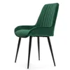 A green velvet chair with black legs against a white background. Náhled obrázku produktu
