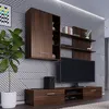 A modern living room with a wall-mounted entertainment unit. Náhled obrázku produktu