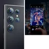 A split image showing the rear camera array of a smartphone on the left and a hand holding a smartphone displaying a night cityscape photo on the right. Produktbild-Vorschau