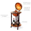 A globe bar cart with wine bottles and glasses on display, with descriptive text labels pointing to its features. Náhled obrázku produktu